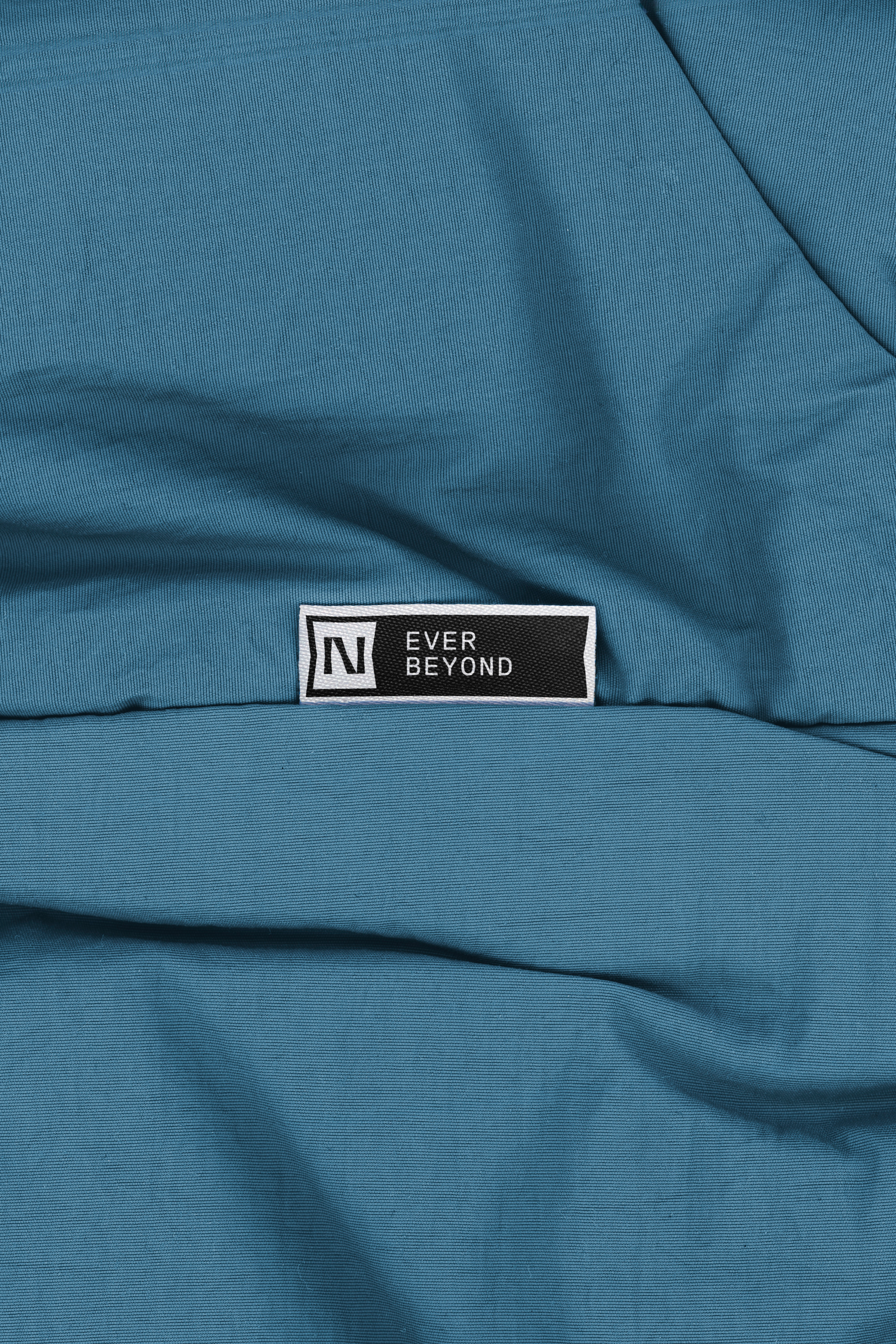 Graphic depicting UI-styled buttons with different categories of interior design items on top of an image of a modern interior living room.