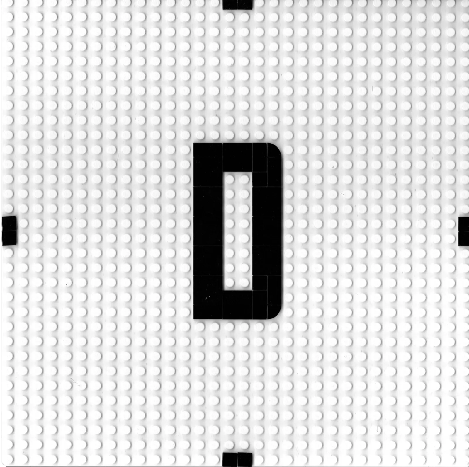 Lettre D de la monochasse Lego, scan sur grille